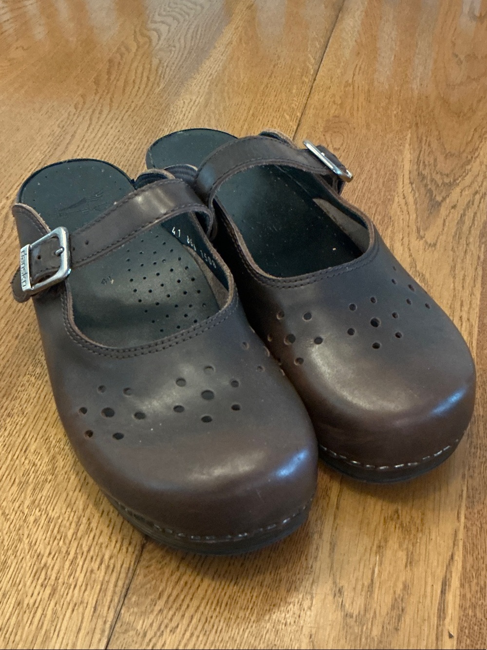 Woman’s Dansko brown mary Jane clog. Size 41. Adjustable strap. Barely worn!Cute